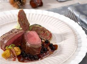 Loin of venison in black forest ham with chestnut and cabbage roulade