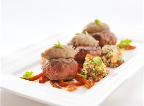 Venison medallions with aubergine relish and grilled peppers