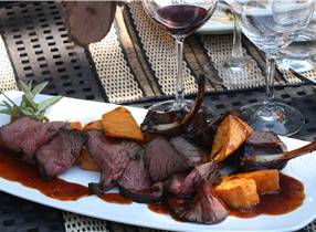 SPIT ROAST OF VENISON WITH SMOKED CORN AND BLACK BEAN HASH