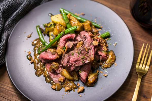 Neil Brazier's Venison roast with kumara hash, green beans and garlic mustard sauce