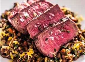 Venison Steaks with Warm Lentil, Shallot and Sun-Blushed Tomato Salad